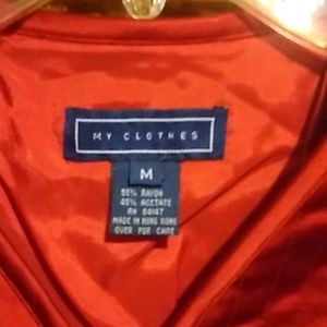 A fitted front zipped jacket worn once no flaws